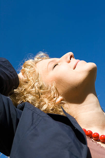 istock Smiling women looks upwards 90151032