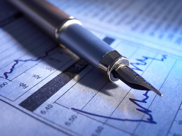 istock Fountain pen and stock charts 90151278