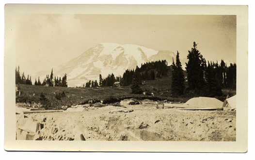 An old vintage photograph of Mt. Rainier in Washington state.