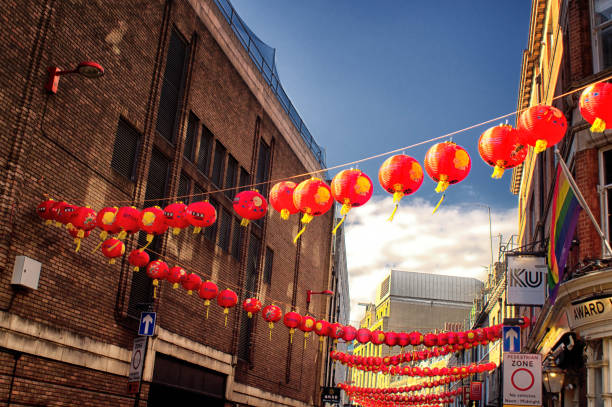 London, UK - March 15, 2016: China Town in London. Photo taken during the day and contains many businesses storefronts in the background.