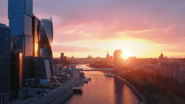 Flying over Moscow International City Business Center at sunrise