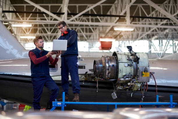 istock Aircraft mechanics in the hangar 901527026