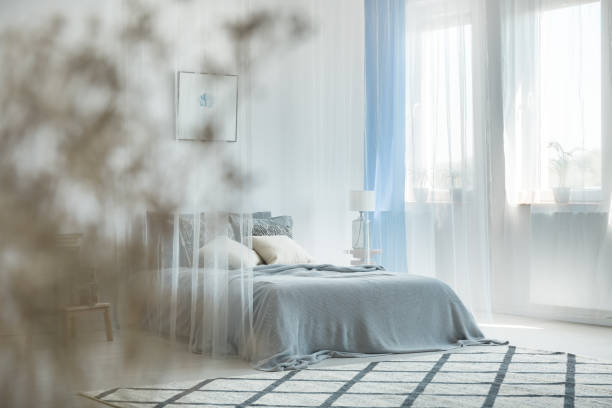 istock Interior of pale blue bedroom 901527266