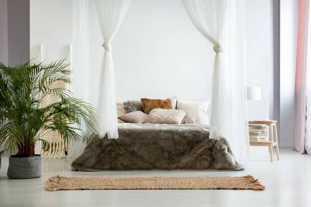 istock Bohemian bedroom with earth colors 901527302