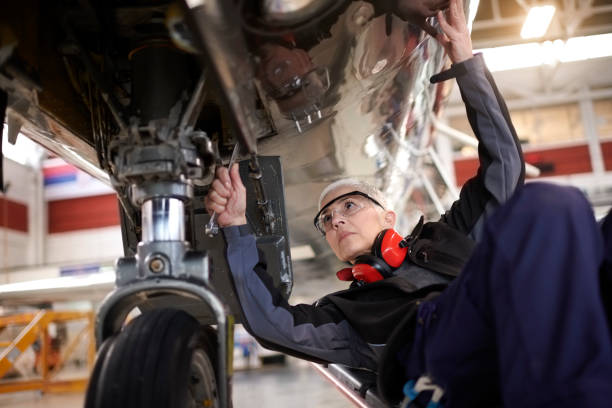 istock Aircraft mechanic in the hangar 901527618