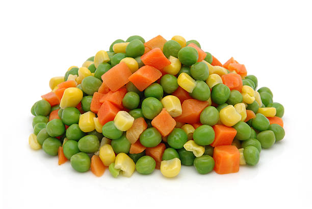 istock Pile of frozen mixed peas carrots and corn 90152976