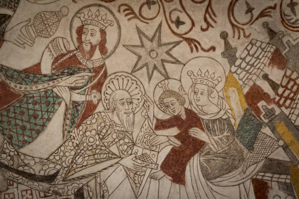 The Holy Kings give their gifts to the christchild, a Fresco The Holy Kings give their gifts to the christchild, Fresco in Draby church, Denmark, January 2, 2018 medieval fresco stock pictures, royalty-free photos & images