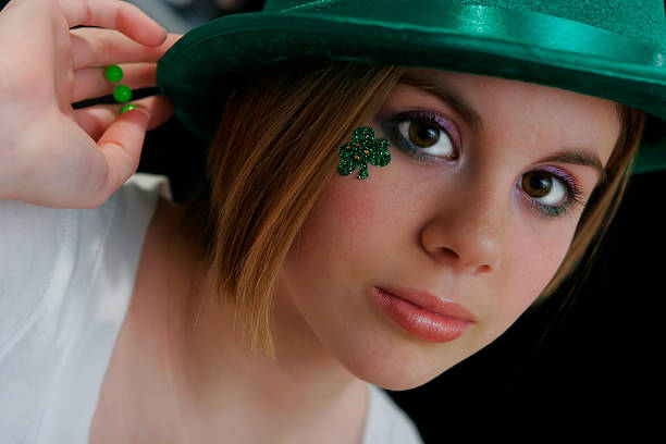 istock girl ready for St. Patrick's day with shamrock under  eye 90153242