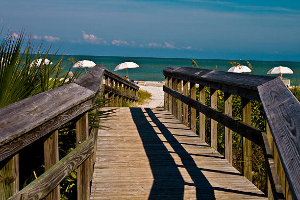 istock Brigde and Beach Umbrellas in Background 90153243