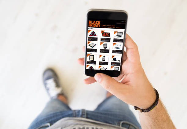 istock male hand black friday  smart phone 901534226