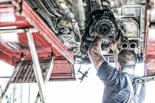 Auto Mechanic at work stock photo