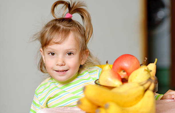 istock Girl and fruit 90153935