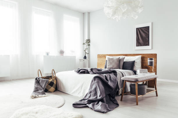 istock Side angle of bright bedroom 901545216