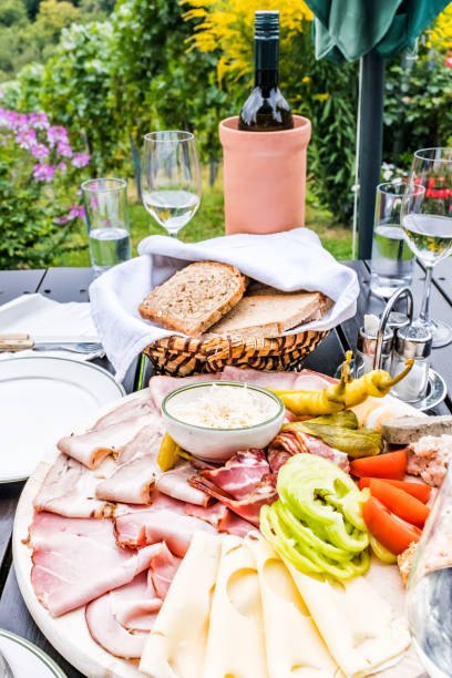 istock Brettljause, traditional cold plate with meal, cheese, vegetable and bread 901549688