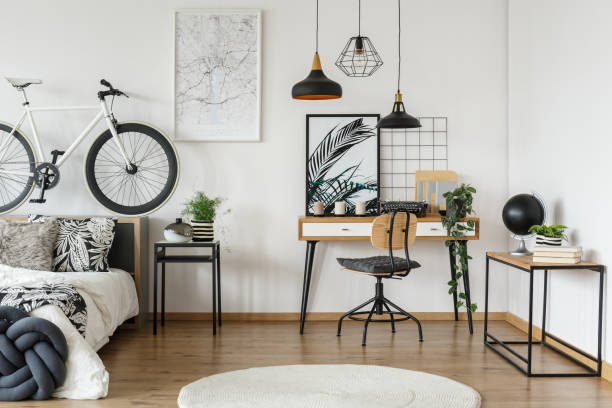 istock Wooden workspace in floral bedroom 901549812