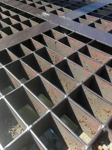 istock Trench drainage ditch grating manhole cover steel 901556844