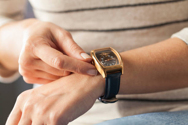 istock Winding up a wristwatch 901558242