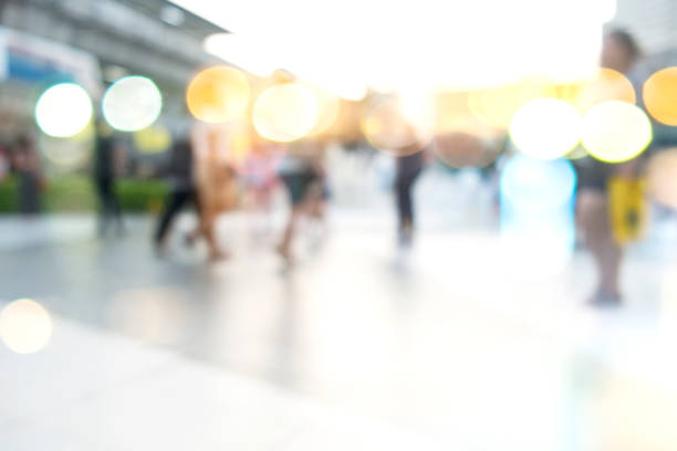 istock city people crowd abstract background blur action 901565842
