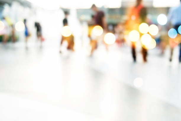 istock city people crowd abstract background blur action 901565856
