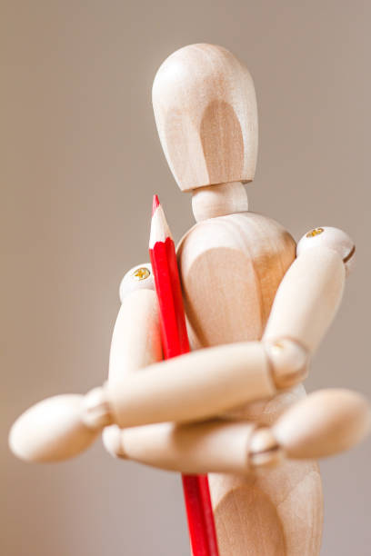 istock Wooden mannequin isolated on white background 901567930