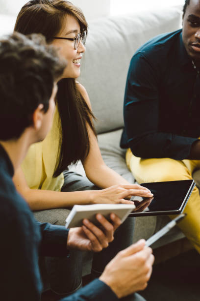istock Meeting with Pen Paper and Tablets 901570808