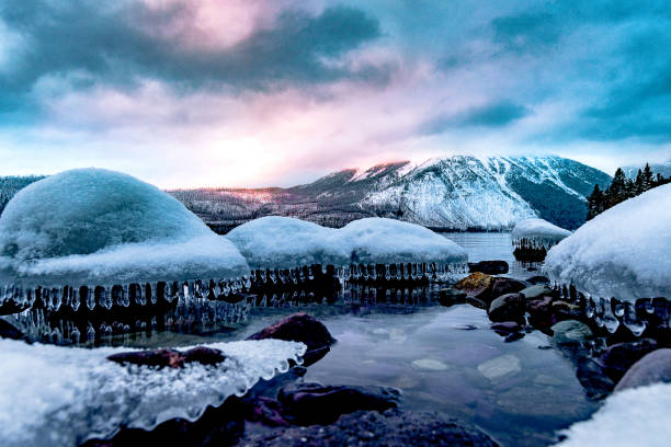 Various video clips of Glacier National Park, Montana, in winter. The video shows the frozen shots of McDonald's Falls.