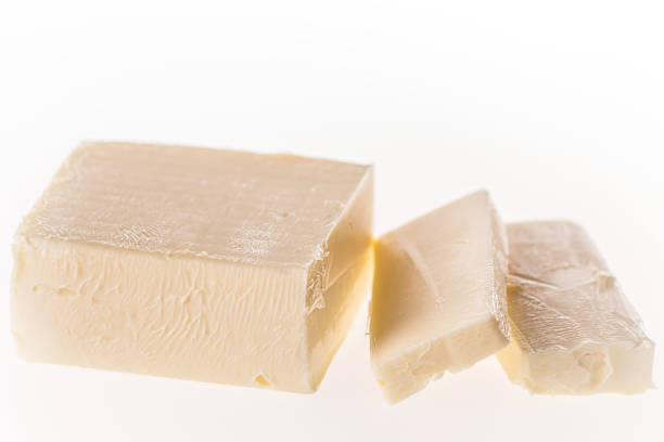 istock sliced butter on whte background 901578682