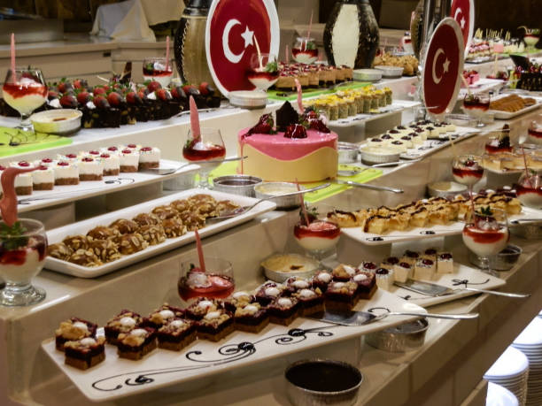 istock Tasteful cakes on cake table in turkish hotel 901579236