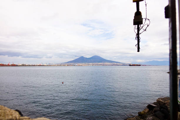 istock Naples waterfront with rocks and boats 901579362