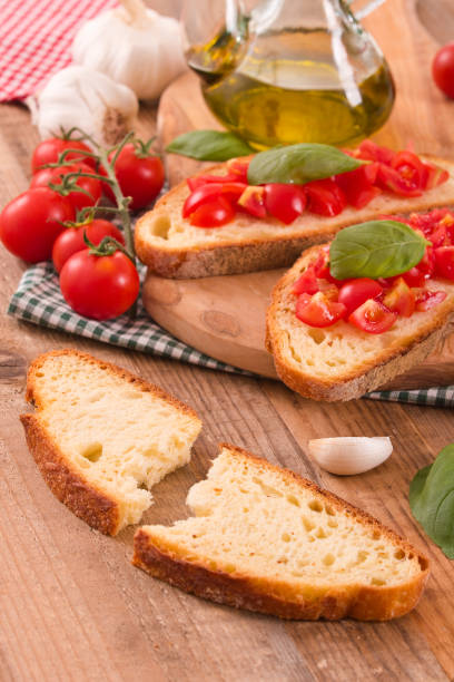 istock Bruschetta bread with basil and chopped tomatoes. 901579472