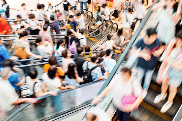 istock Motion escalators at the modern shopping mall 901579728