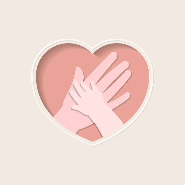 Hands of mother and baby in heart shaped paper art Big hand holding small one represent mother and baby, in pink heart shaped frame paper art greeting card kid holding fathers hand stock illustrations
