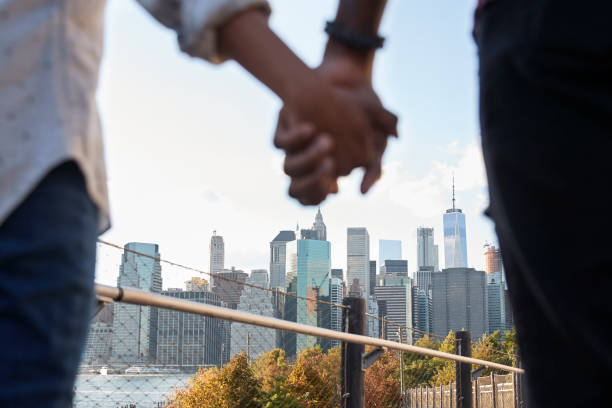 istock Couple Visiting New York With Manhattan Skyline In Background 901584854
