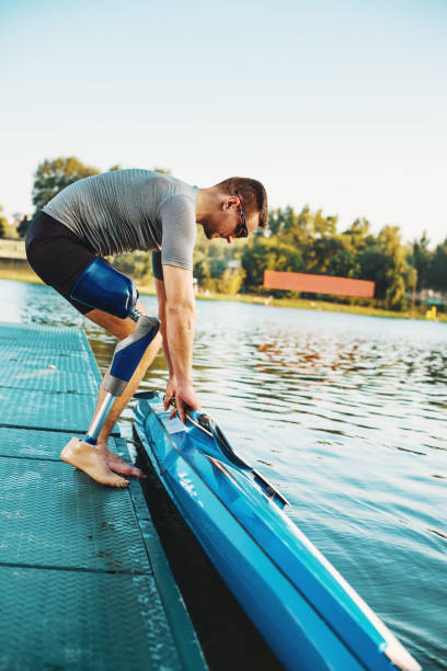 istock Young man with prosthetic leg on outdoor training 901587166