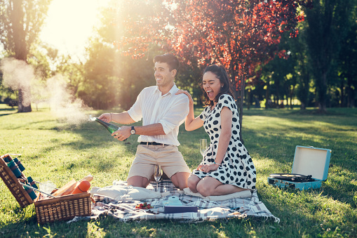 Lovely couple enjoying a picnic on Valentine’s day