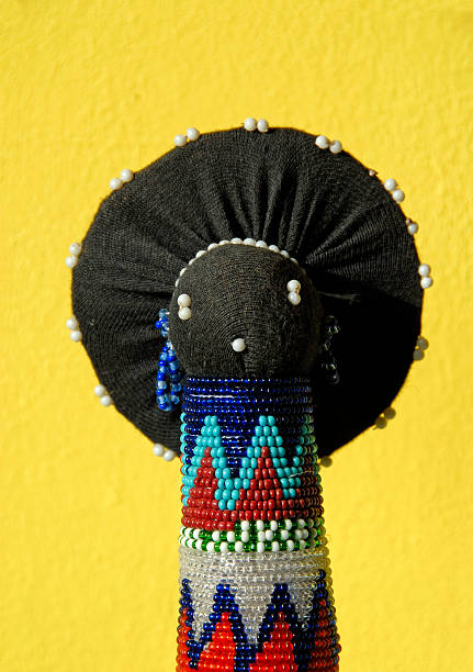 Doll representing the Zulu Sangoma,traditional healers. Made by the Zulu mothers for their children,using plastic beads and wool.