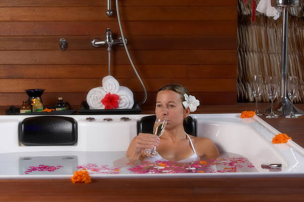 istock young woman drinking champagne 90159423