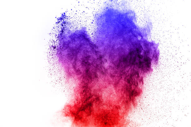 abstract blue-red dust explosion on  white background. abstract blue-red powder splattered on white  background, Freeze motion of blue-red powder exploding.