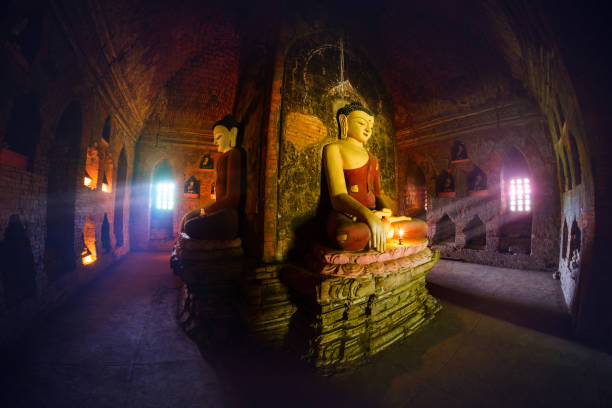 istock Buddha statue inside old pagoda at Bagan, Myanmar. 901595282