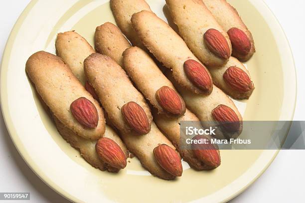 Closeup Of Finger Shape Halloween Cookies With Almond Nuts Stock Photo - Download Image Now