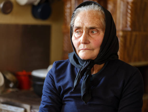 istock Old woman indoor 901598560