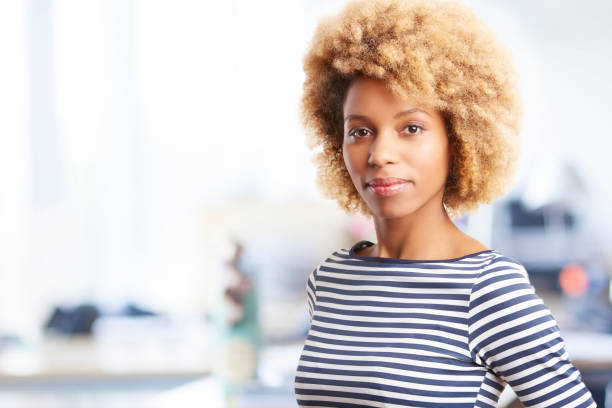 istock Confident young woman portrait 901598926