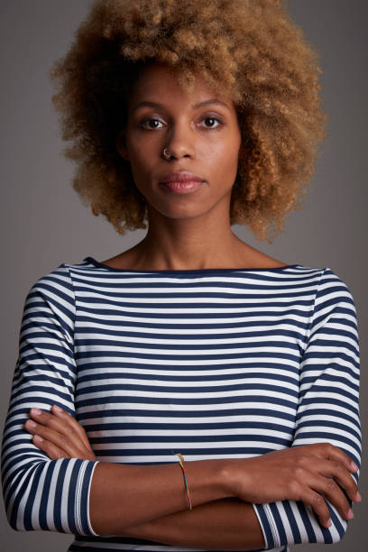 istock Confident afro-american woman studio shot 901601556
