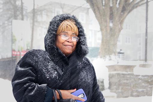 Philadelphia, PA/USA - January 4, 2018: Rose Wood, Philadelphia area resident, walks in blizzard conditions to a job interview as the region braces for the January 4, 2018 'Bomb Cyclone' winter storm.