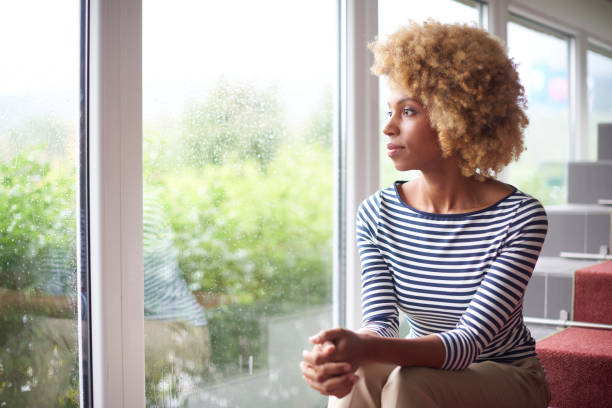 istock Young woman looking thoughtfully 901602658