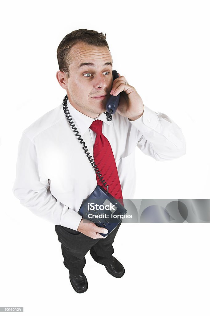 Uomo d'affari con telefono - Foto stock royalty-free di Abbigliamento elegante