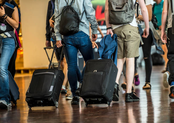 istock Travelers in Airport 901609682