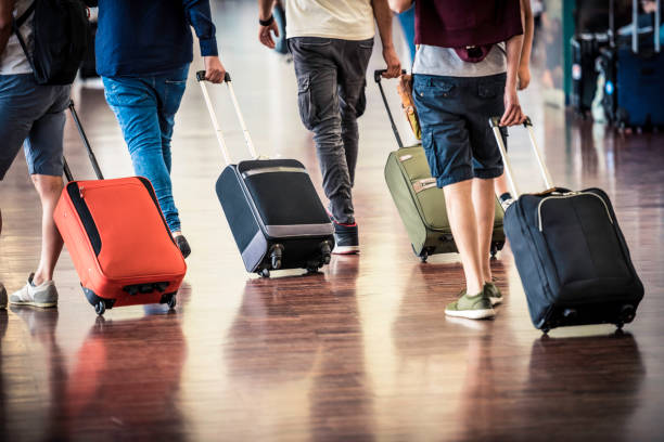 istock Travelers in Airport 901609714
