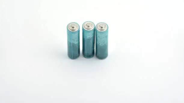 Photo of Three AAA batteries isolated on white background