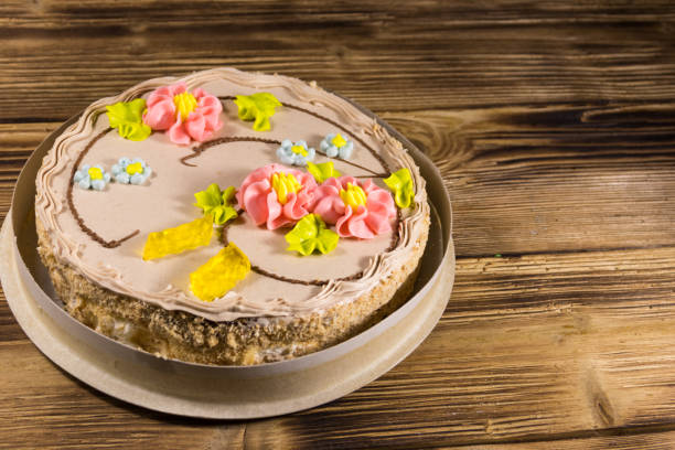 istock Cardboard box with Kiev cake with cream, nuts and meringue 901617722